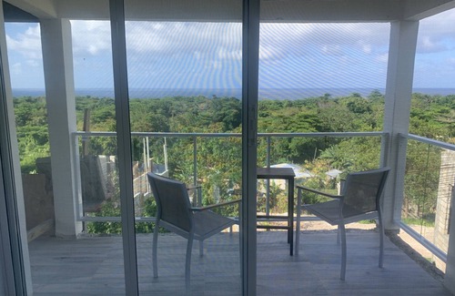 Port Antonio House | Kinda Glamping, Almost a Home with Beautiful Sea + Mountain Views