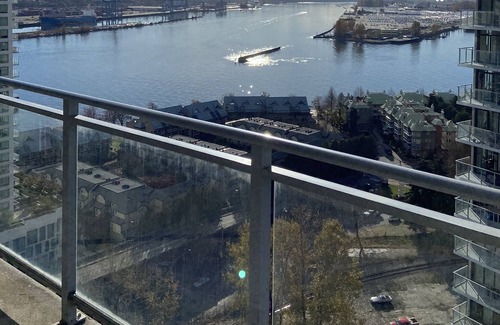 Downtown New Westminster Apartment | King bed River views skytrain in building