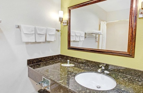 La Porte Hotel | King Bed Room, Scottish Suites La Porte, Guest Laundry, Free On-site Parking