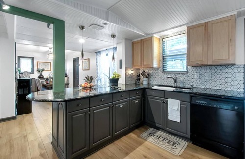Wichita House | King Estate with attached Mid-Century Apartment & Gym.