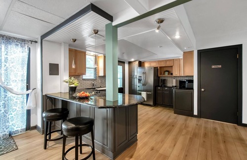 Wichita House | King Estate with attached Mid-Century Apartment & Gym.