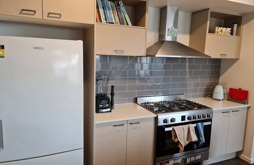 Delacombe House | King Family room with shared bathroom