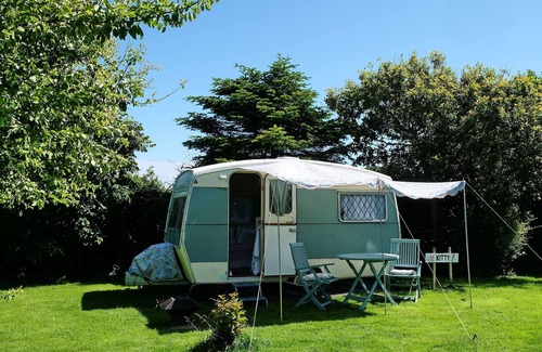 Helston Cabin | Kitty Unique 60s Caravan set in Pretty Garden