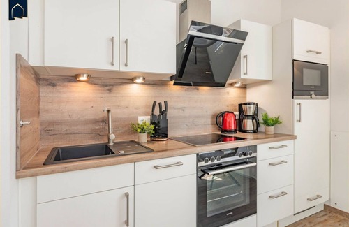 Ostvorpommern Apartment | Kleines Kuschelnest - Beautiful vacation apartment with lagoon view and terrace
