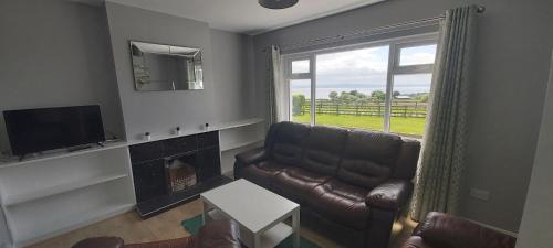 Moville House | Knockalt Cottage