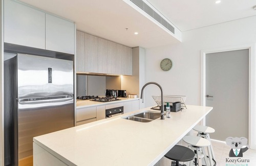 Rhodes Apartment | KozyGuru | Rhodes | Stylish Waterfront Living