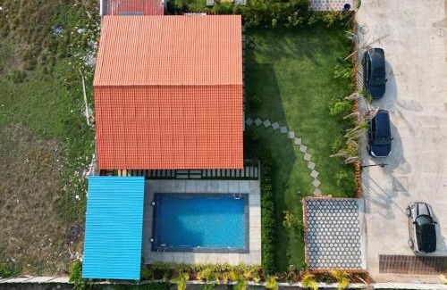 Chevella Ski Chalet | Kuku farm stay 3 bedroom wooden cottage with private pool at Moinabad