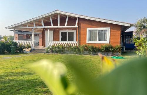 Chevella Ski Chalet | Kuku farm stay 3 bedroom wooden cottage with private pool at Moinabad