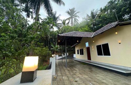Talipparamba Apartment | Kurinjirappallil Farms Homestay