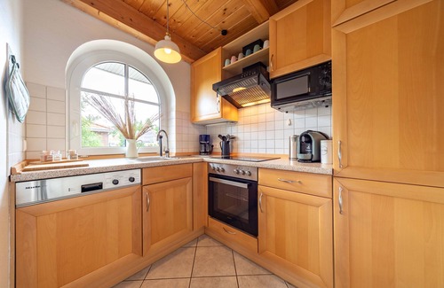 Tannenhausen House | Lüttje Huck Ferienwohnung 4 - mit Sauna & Seeblick