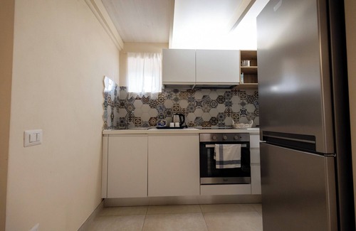 Sasso Barisano Apartment | La finestra sul campanile - Rosaria