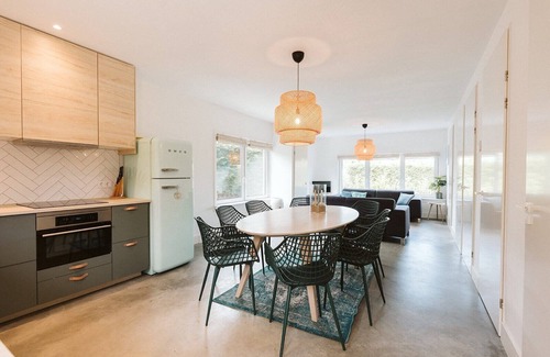 Ouddorp House | La Folie': a large, elegantly furnished holiday home with plenty of privacy at the back of a green family park.