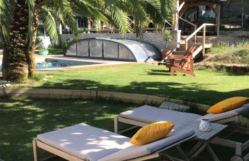 La Couarde-sur-Mer House | LA MAISON DE LA DUNE - Chambres Climatisées - Jacuzzi 1ère séance offerte - Piscine chauffée avec Abri Amovible - Plage située à 200m, accès direct par le bois