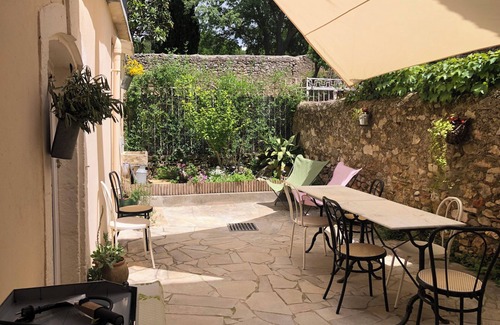 Montpeyroux House | "la maison de Marie" 17th century village house stone arches courtyard + terrace