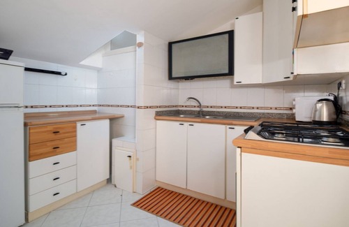 Civitavecchia Apartment | La Mansarda di Via Montegrappa by Rentbeat