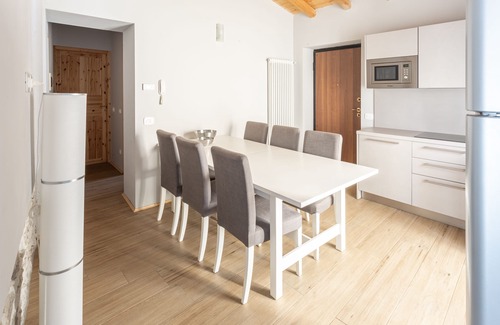 Orino Apartment | La Posteria Penthouse 7 by icasamia.it