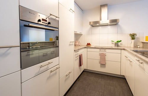 Engadin Scoul Apartment | La Stüvetta: Modern, high-quality 2.5 room apartment right next to the Motta Naluns mountain railroad