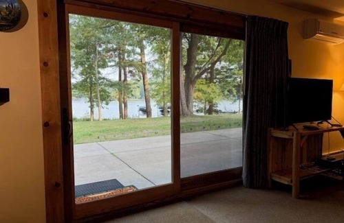 Eagle River Condo | Lake Forest Resort – Relax on a Pristine Sandy Beach in the Northwoods!