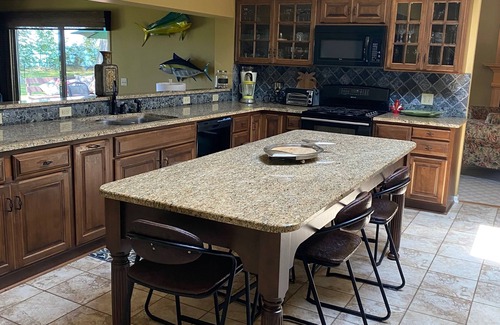 Irving House | Lake Front Home. Private stairs to private beach and bay. upscale 5 bedroom home