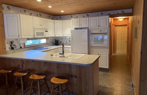 North Lake George House | Lake George Waterfront with Dock Space, fire pit and game room!