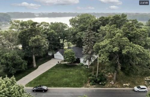 Brooklyn Center House | Lake House- Four Bedroom retreat, King bed, Beautiful Sunset!