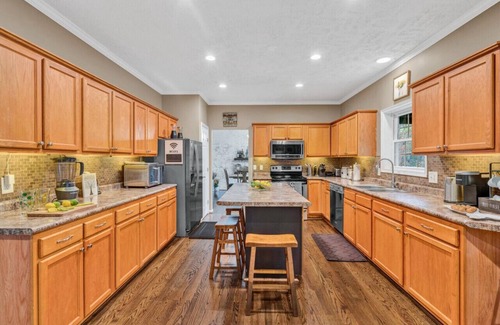 High Point House | Lake-It- Easy- Pet-friendly home with sunrise views. E enjoy the kayaks during the day and the firepit in the evening.
