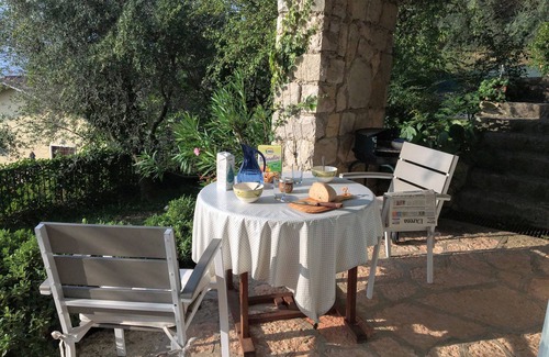 Torri del Benaco Apartment | Lake view apartment with private garden and swimming pool, in the green of olive trees
