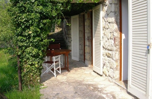 Torri del Benaco Apartment | Lake view apartment with private garden and swimming pool, in the green of olive trees