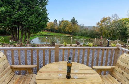 Cheriton Bishop Ski Chalet | Lake View Holiday Home - Fishing Lakes, Heated Outdoor Swimming Pool 500yrds on Sister Park