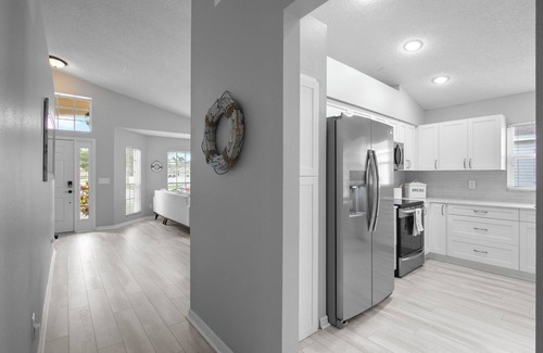 Sabal Harbour House | Lakefront Bradenton with Heated Pool, WiFi, Fitness Room, Resort-Style Amenities