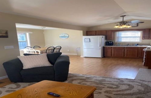 Jacksboro Cottage | Lakefront Cabin in quiet cove. No steps to private boat slip. Pet friendly.