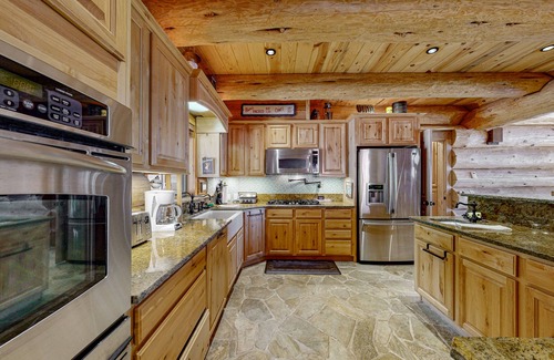 Tamarack Resort Cabin | Lakefront cabin with game room, sauna, lake views, private beach, grill, deck