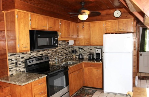 Stevensville House | Lakefront Chalet #23 w/Beach Access, Pools, Sport Courts, Fishing Pond & more!
