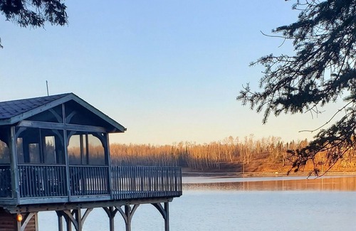 West Hawk Lake Cottage | Lakefront cottage with hottub and boathouse