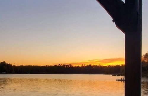 West Hawk Lake Cottage | Lakefront cottage with hottub and boathouse