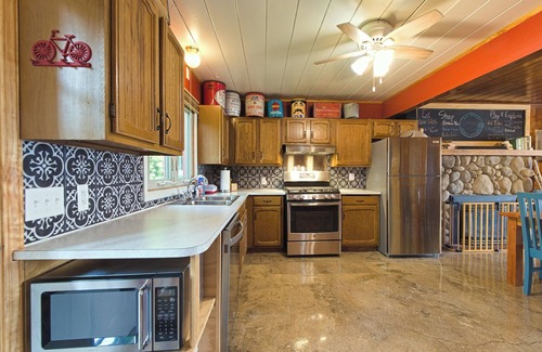 Lake Odessa Cabin | Lakefront Cottage In Town; Walk to Restaurants; Hot Tub