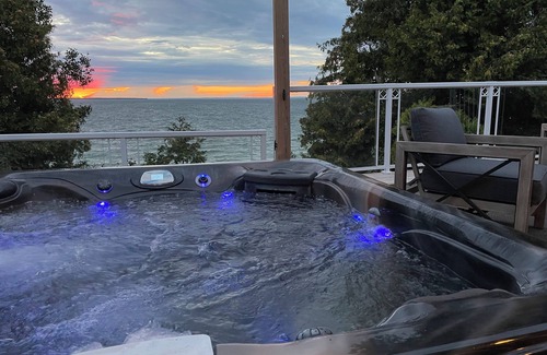 Brock House | Lakefront Cottage w/Hot Tub, BBQ Grill, Patio, Fire Pit, Dock, Sauna, Fire Place