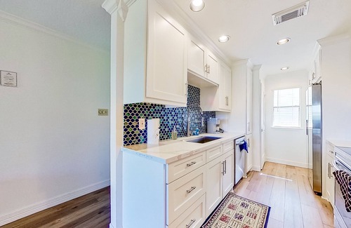 Walden on Lake Conroe Condo | Lakefront dog-friendly condo with lake views, pool, BBQ area, balcony, elevators