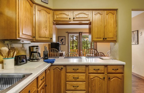 Mercer House | Lakefront dog-friendly gem with private dock, wood stove, large deck & free WiFi