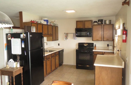 Grand Isle House | Lakefront Home, 60 Ft. Dock, Great Sunsets, Internet, Walk to Ladds Marina