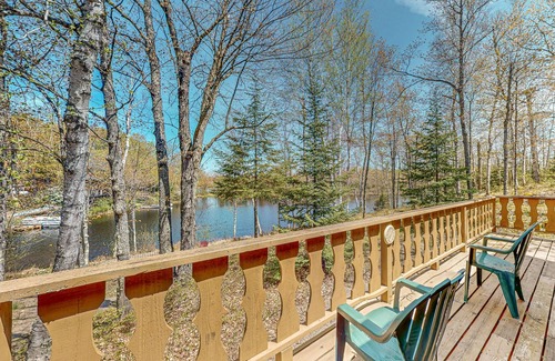 Presque Isle House | Lakefront home with large patio, fire pit, & a provided kayak