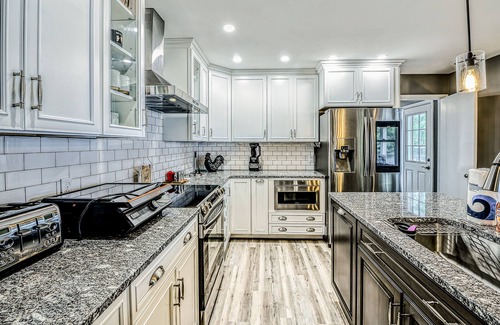 Bumpass House | Lakefront Home with Private Dock, Hot Tub, Fireplace, & Central A/C - Free WiFi