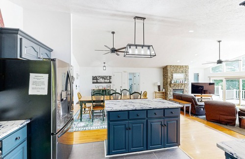 Bumpass House | Lakefront home with two kitchens, a dock, firepit, & pontoon