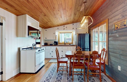 Wakefield House | Lakefront house with firepit, beach access, deck, grill, woodstove, & central AC