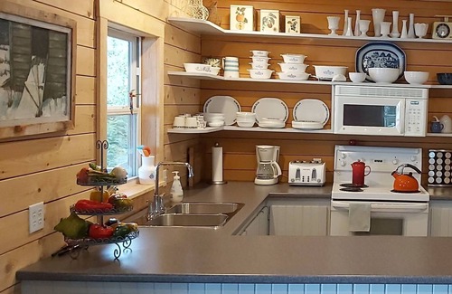 Lower Ohio Cottage | Lakefront Living in a Sunset Cove with kayaks