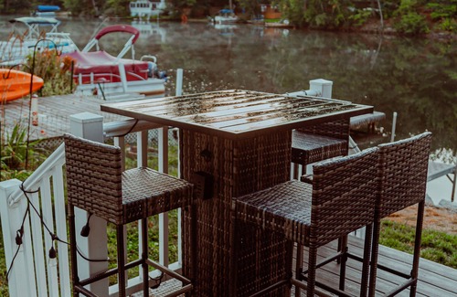 Westminster Cottage | Lakefront; view of ski mountain, firepit, dock, kayaks, paddle board
