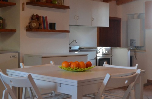 Oliveto Lario Cottage | Lakeside cottage with private garden and pier. Pet-friendly.