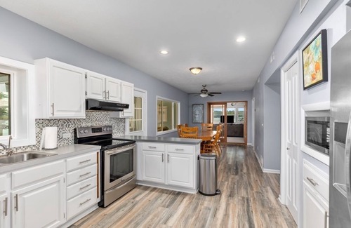 Newaygo Cottage | Lakeside Getaway: Dock, Kayaks, Firepit, Grill