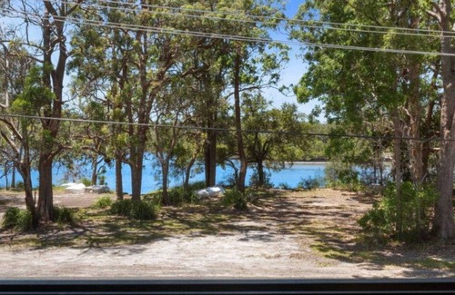 Laurieton House | Lakeside Lodge - Fabulous Waterfront Holiday