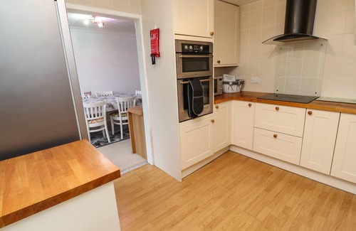Mullion House | LAMORNA, character holiday cottage, with open fire in Mullion